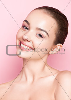 Beauty girl natural makeup with cute smile on pink