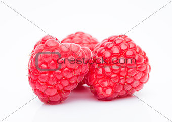Fresh healthy red raspberries white background