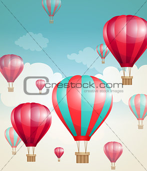 Red air balloons and clouds.