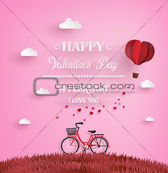 Red bikes parked on the grass with heart shaped balloons  floati