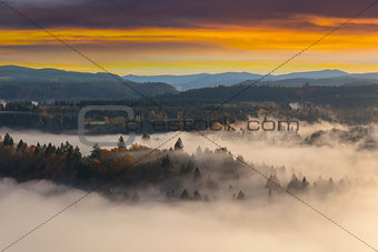 Foggy Sandy River Valley during Sunrise