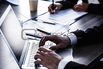 Man working on a laptop. Concept of internet sharing and interconnection
