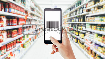Woman scanning a barcode with her phone