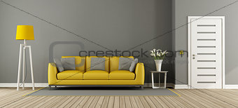Gray living room with yellow sofa