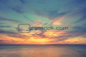 Aerial panoramic view of sunset over ocean