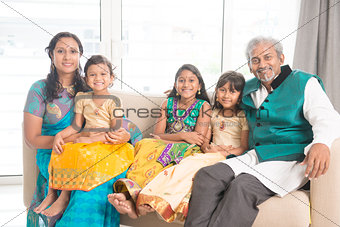 Portrait family of five smile at camera
