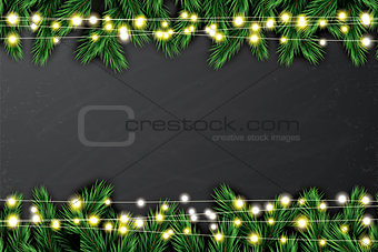 Fir Branch with Neon Lights on Chalkboard Background.