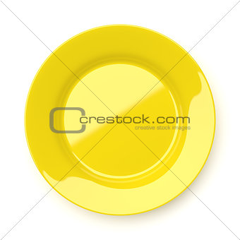 Empty yellow ceramic round plate isolated on white
