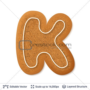 Gingerbread letter K isolated on white.