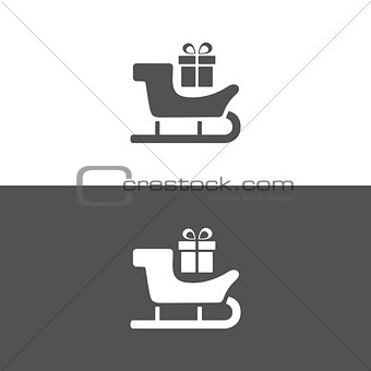 Sled icon with gift on white and black background