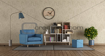 Blue armchair in modern lounge