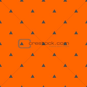 Tile vector pattern with black triangles on orange background
