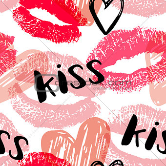 Seamless pattern with pink and red kisses