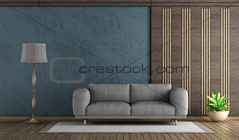 Elegant blue living room withh gray sofa