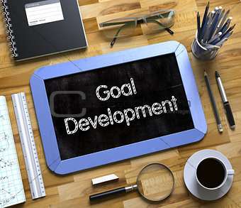 Goal Development - Text on Small Chalkboard. 3D.