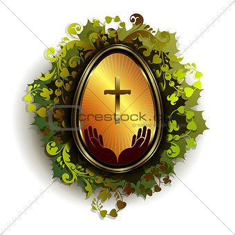 golden Easter egg with a cross and a wreath of leaves