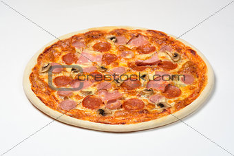 Pizza with Bavarian sausage, cervelat, carbonate, mozzarella cheese on white background