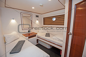 Cabin in a luxury private motor yacht