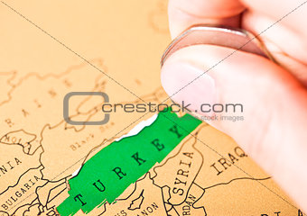 Travel holiday to Turkey concept female hand coin
