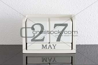 White block calendar present date 27 and month May