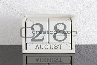 White block calendar present date 28 and month August