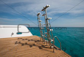 Ladders on the back of a luxury motor yacht