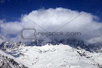 Mount Ushba in clouds at winter