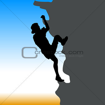 Black silhouette rock climber on against the blue sky
