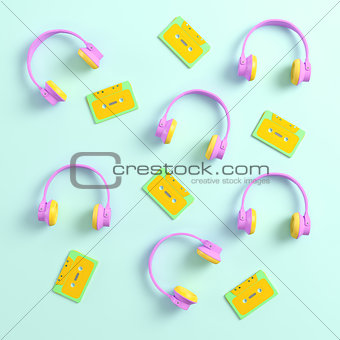 Headphones and retro cassette tapes on bright background