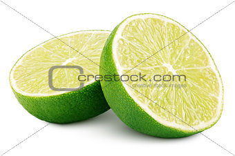 Two halves of green lime citrus fruit on white