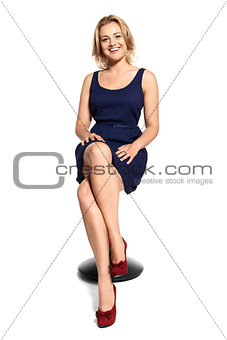 Smiling Young Woman Sitting on Stool