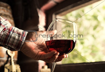 Sommelier tasting a glass of red wine