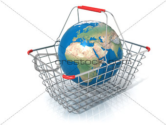 Globe in steel wire shopping basket isolated