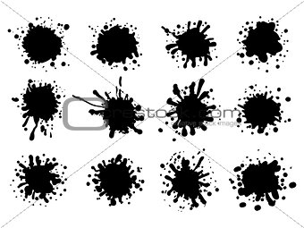 Set of black ink splatters.
