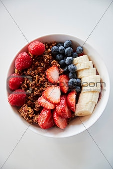 Bowl Of Granola And Fresh Fruit For Healthy Breakfast