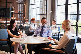 Business colleagues relaxing at their office cafe