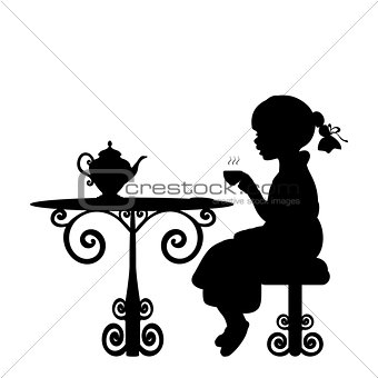 Silhouette girl drink tea at table