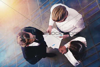 Business people works with statistics number of the company. double exposure
