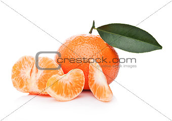 Fresh organic peeled mandarin fruit with leaves 