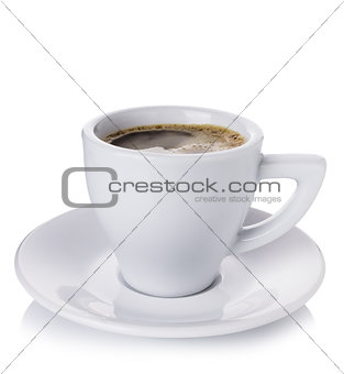 White cup with coffee on a white plate