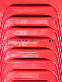 Closeup of the plastic chair stack.