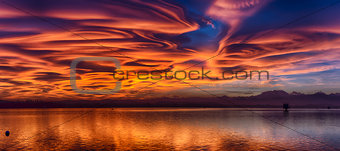 Amazing lenticular clouds at the sunset