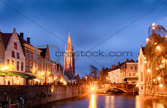 Bruges cityscapes during christmas with lights and blue skies, B