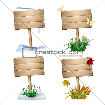 Set of wooden signs in four seasons.