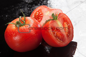 Tomatoes On A Glass Background