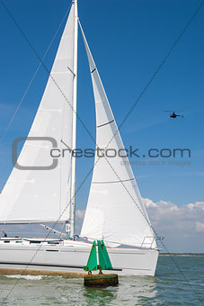Sailing Boat Yacht and Helicopter