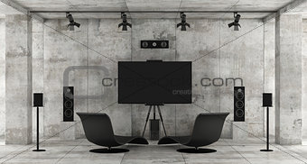 Home cinema system in a concrete room