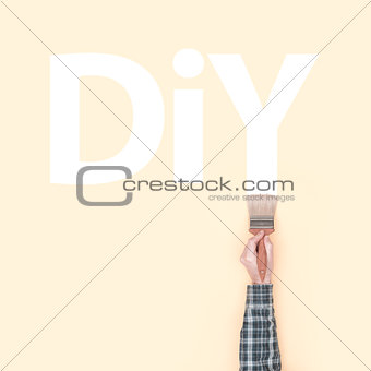 Decorator painting DIY on a wall