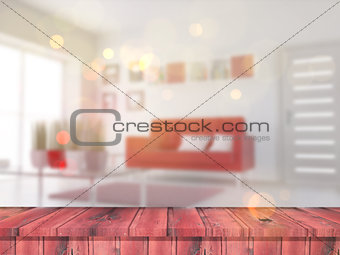 3D wooden table looking out to a defocussed lounge interior