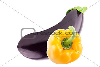 One Fresh eggplant and one sweet peppers bell over white 